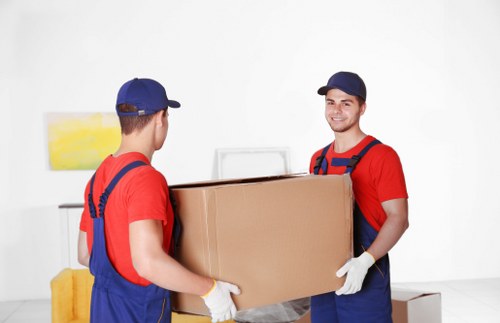 Man and van moving furniture in Ilford residential area