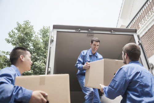 Office relocation planning in Ilford with desks and boxes prepared for transport