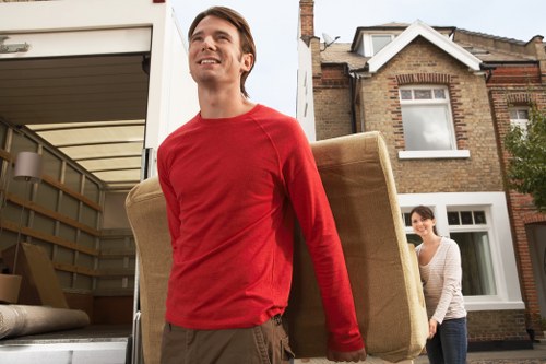 Packed boxes and furniture prepared for a local home removal