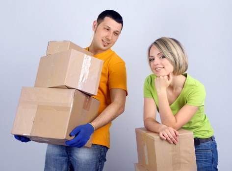 Removal team planning a move from a busy Ilford property
