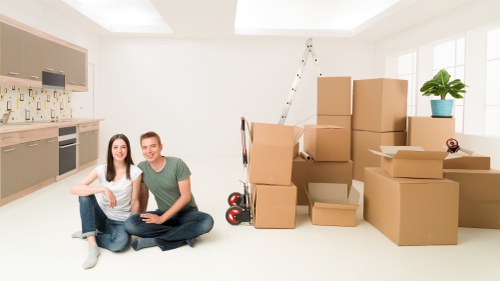 Protective moving team safeguarding a home during unloading