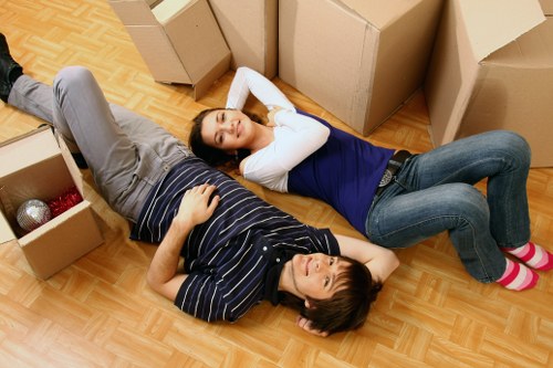 Student moving checklist and boxed belongings prepared for Ilford removals