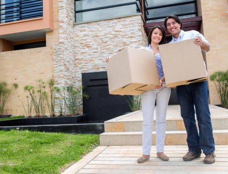 Packing and loading household items into a van